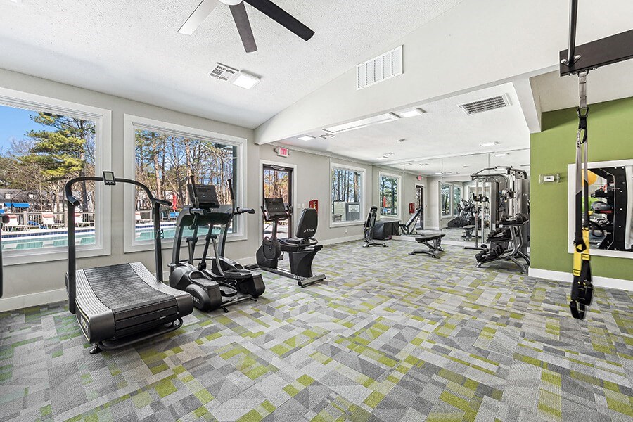 Community Fitness Center with Equipment at Paramont Apartments in Duluth, GA.
