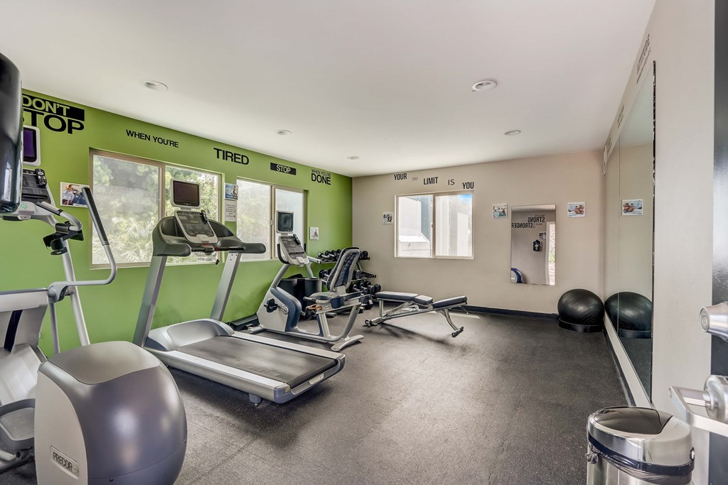 Community Fitness Center with Equipment at Cove La Mesa Apartments located in La Mesa, CA.