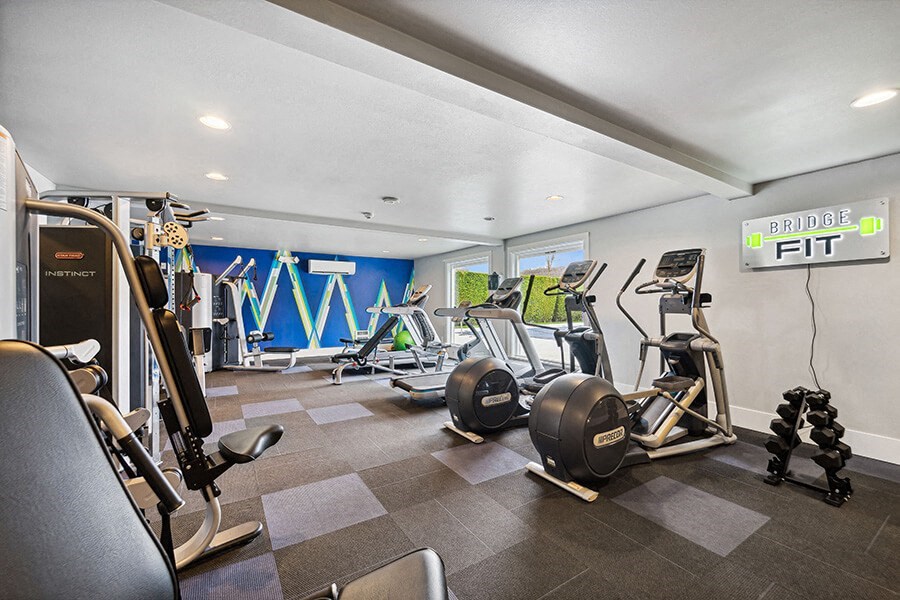 Community Fitness Center with Equipment at Central Flats Apartments in Kent, WA.