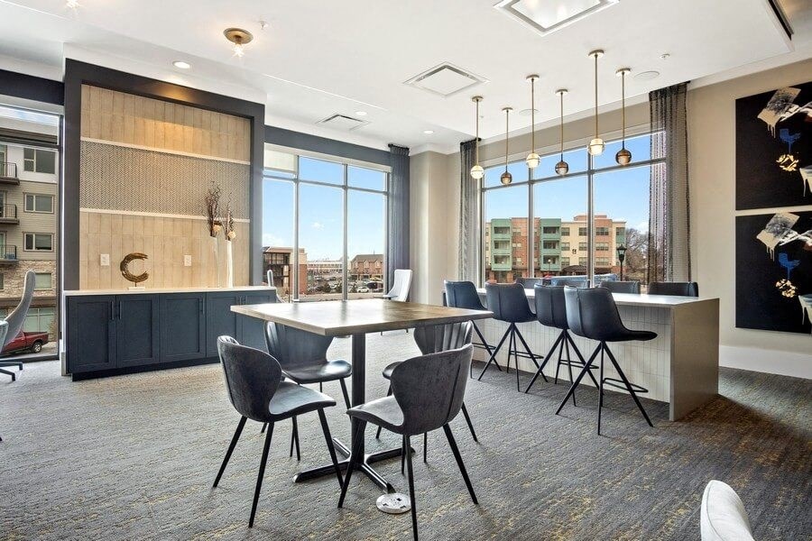 Bar table area with large windows