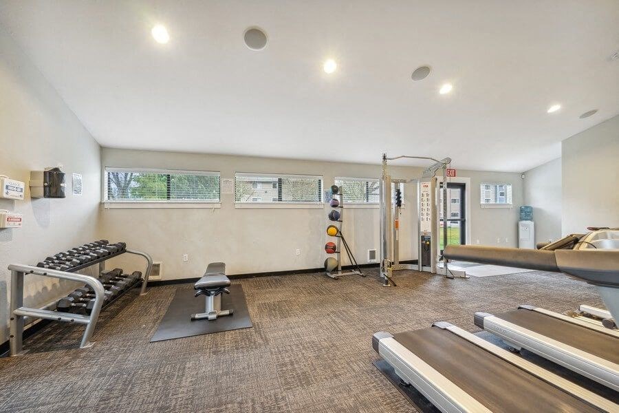 Community gym with weightlifting and cardio equipment