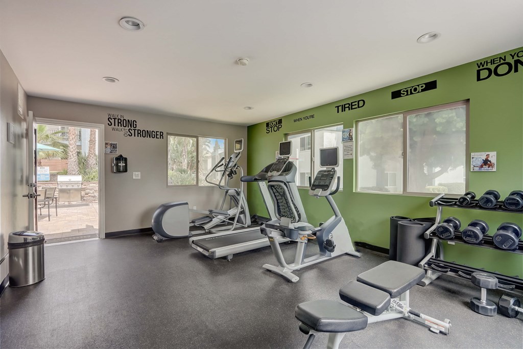 Community Fitness Center with Equipment at Cove La Mesa Apartments located in La Mesa, CA.