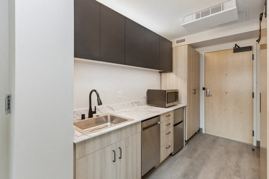 Model kitchen space with dishwasher