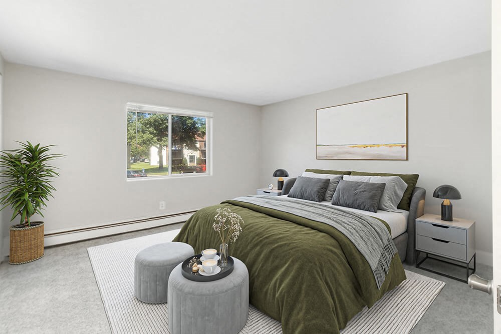 Model bedroom with queen bed