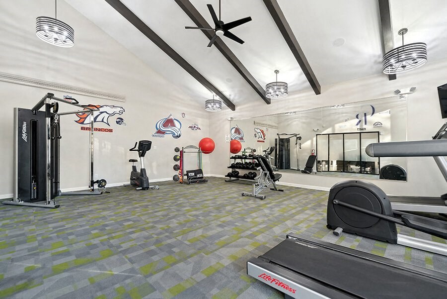 Community Fitness Center with Equipment Community Fitness Center with Equipment at Liberty Creek Apartments in Aurora, CO.