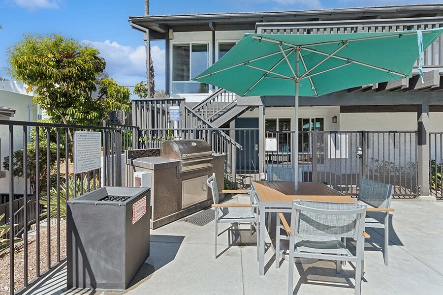 Outdoor BBQ Area with Furniture at Colonnade at Fletcher Hills Apartments in El Cajon, CA.