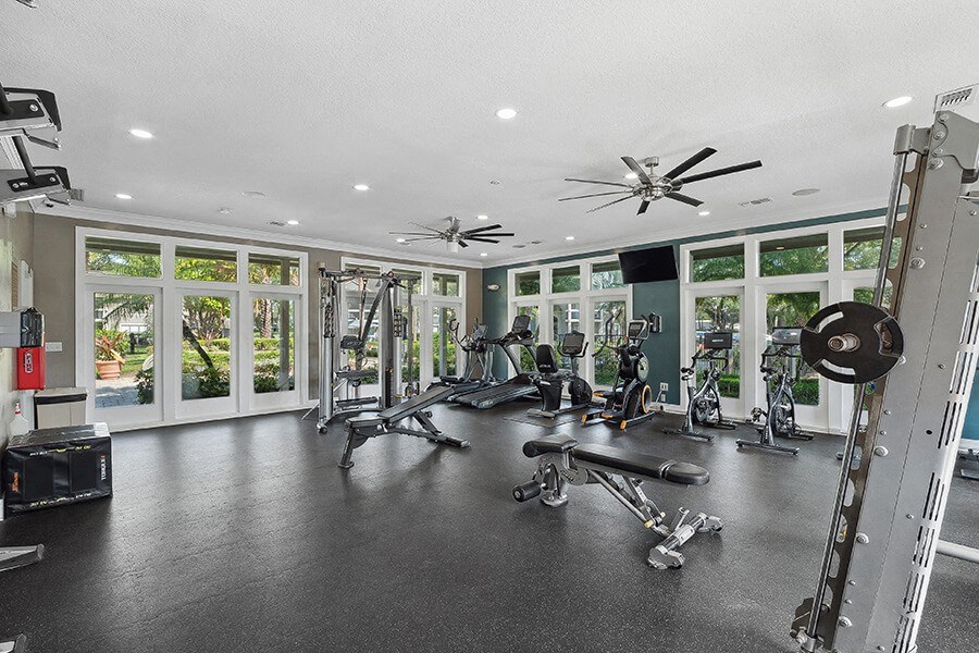 Community Fitness Center with Equipment at Fountains Lee Vista Apartments in Orlando, FL.