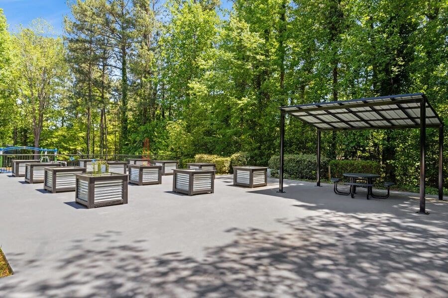 Outdoor Planter Boxes and Canopy Area at Dunwoody Village Apartments in Atlanta, GA.