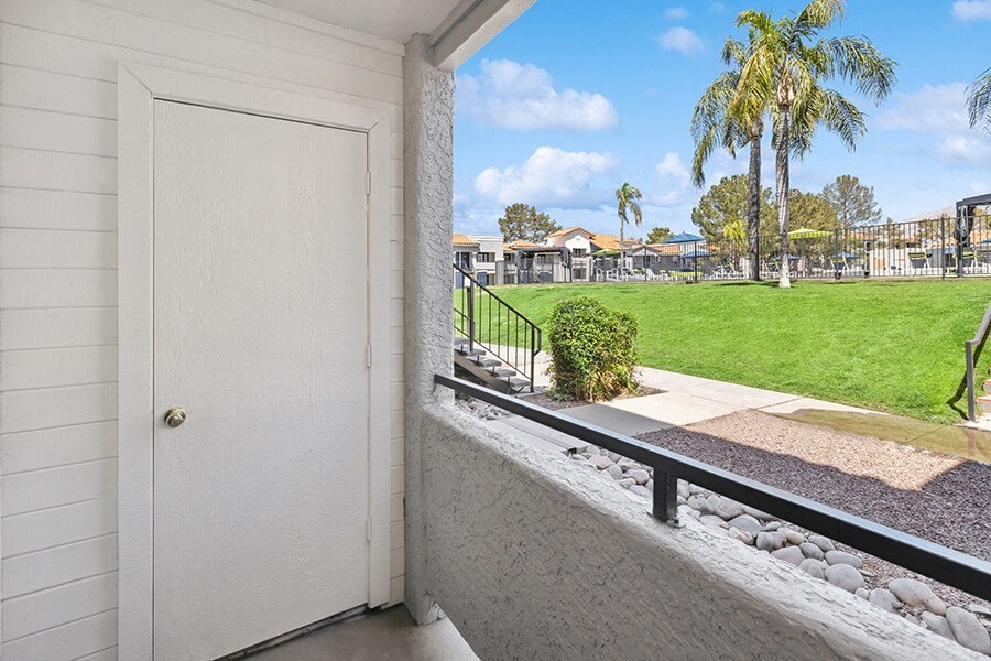 Model Outdoor Patio Area at Hilands Apartments in Tucson, AZ.