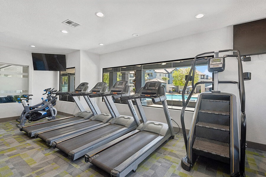 Community Fitness Center with Equipment at Array South Mountain Apartments in Ahwatukee, AZ.