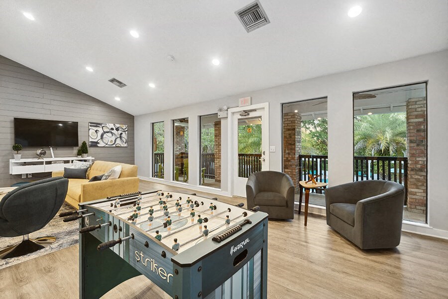 Community Clubhouse Game Tables at Grand Pavilion Apartments in Tampa, FL.