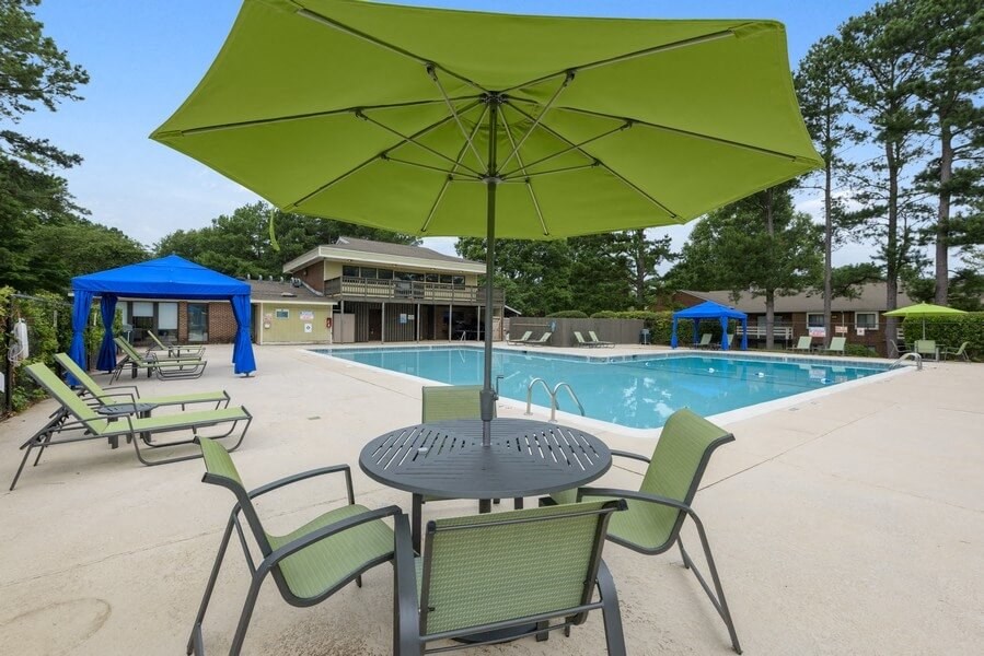 Poolside cabanas and lounge chairs