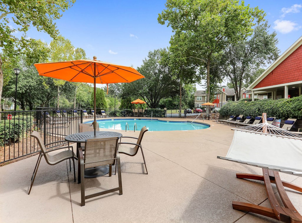 Poolside cabanas and lounge chairs