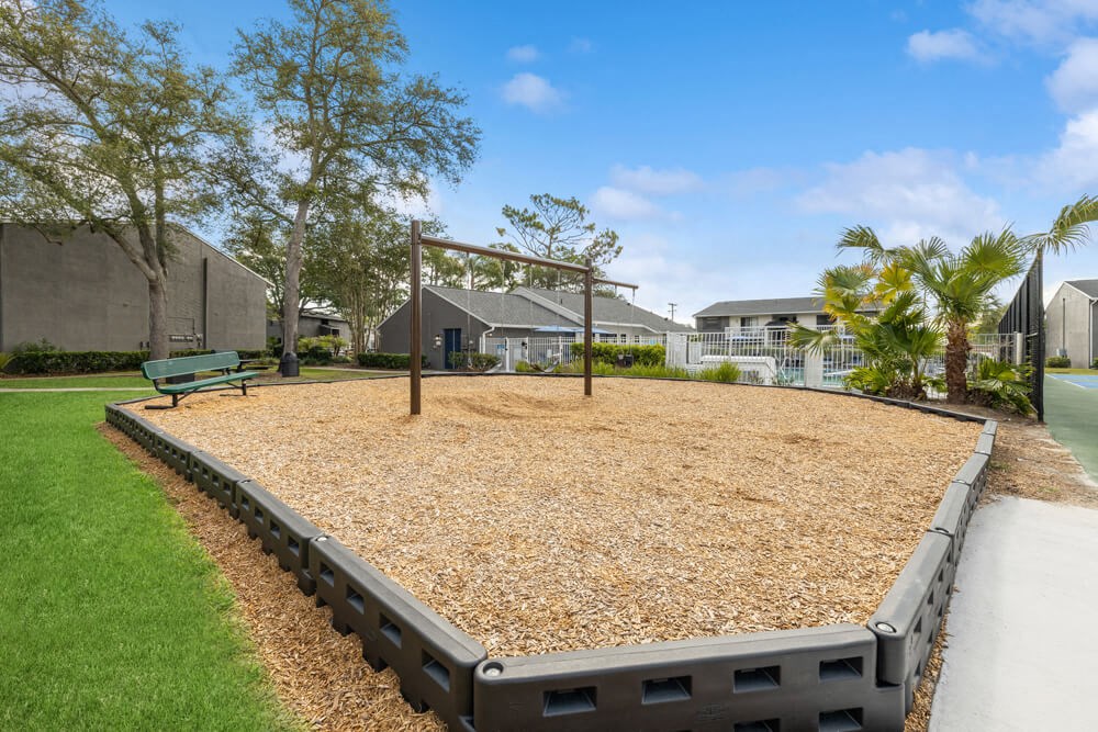 Community swing set with bench