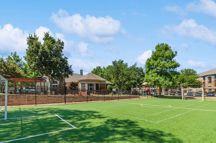 Community Soccer Field with Nets at Belmont at Duck Creek Apartments in Garland, TX.