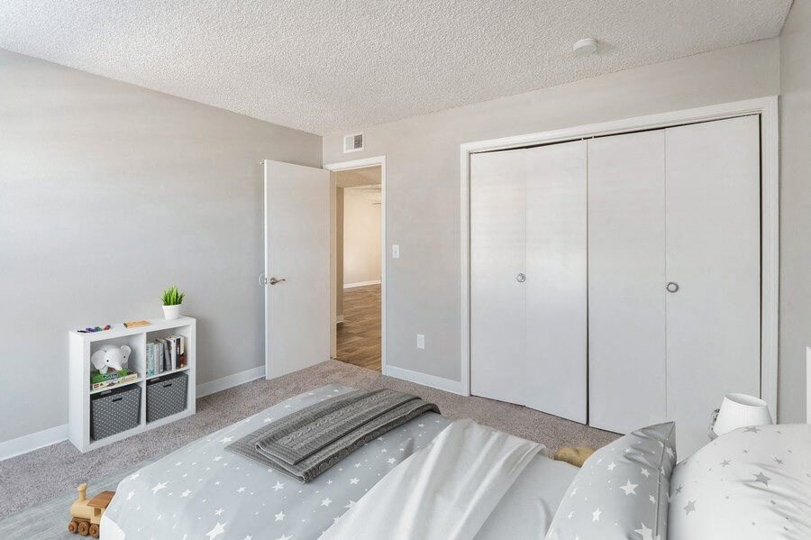 Model Bedroom with Carpet at Indigo Park Apartments in Albuquerque, NM.