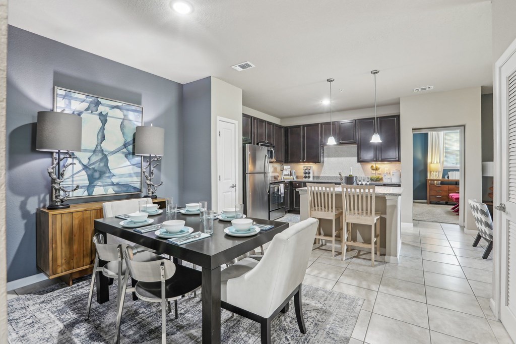 Model kitchen with a dining table set for four.