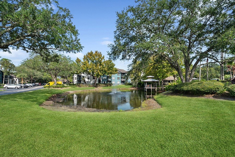 Community Pond and Landscape at Fountains Lee Vista Apartments in Orlando, FL.