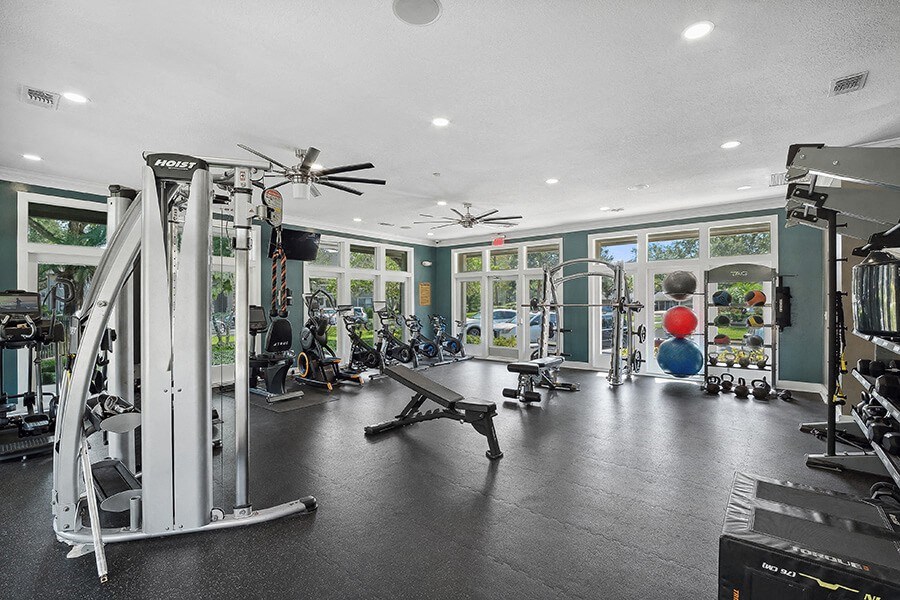 Community Fitness Center with Equipment at Fountains Lee Vista Apartments in Orlando, FL.