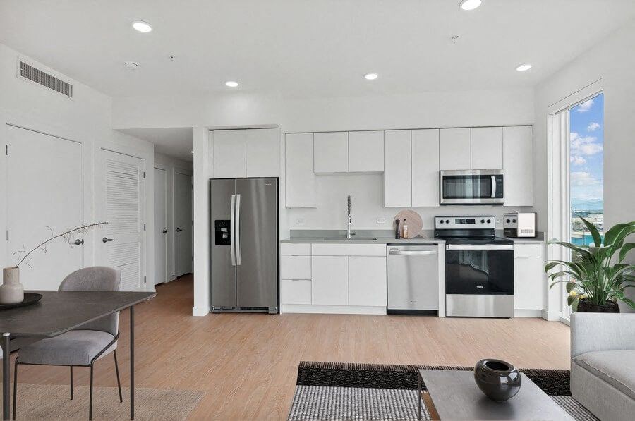 Large model kitchen with stainless steel appliances at 801 Flats located in Post District Residences in downtown Salt Lake City, Utah