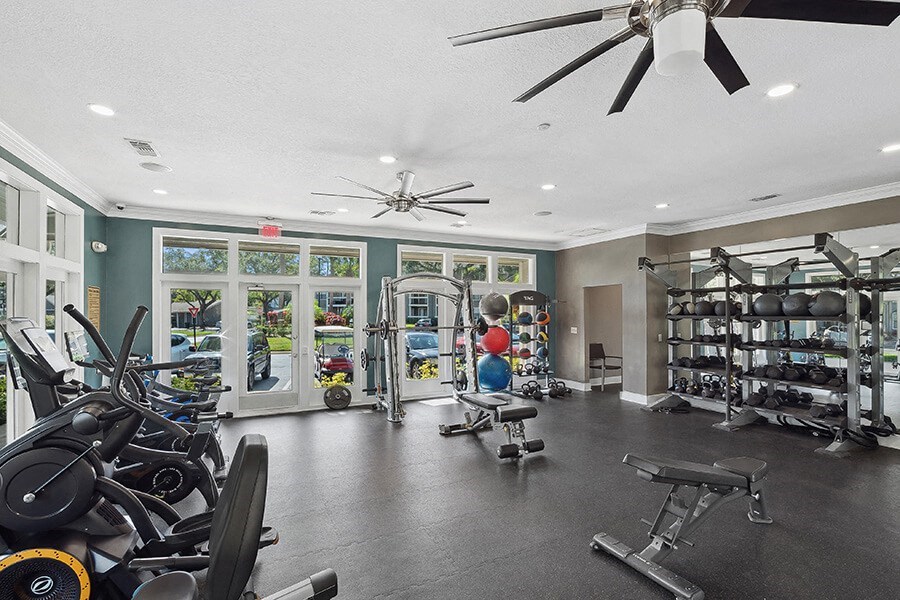 Community Fitness Center with Equipment at Fountains Lee Vista Apartments in Orlando, FL.