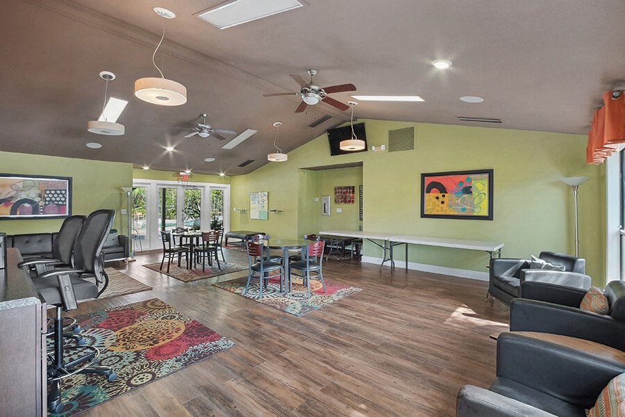 Community Clubhouse with Lounge Furniture at Fountains Lee Vista Apartments in Orlando, FL.