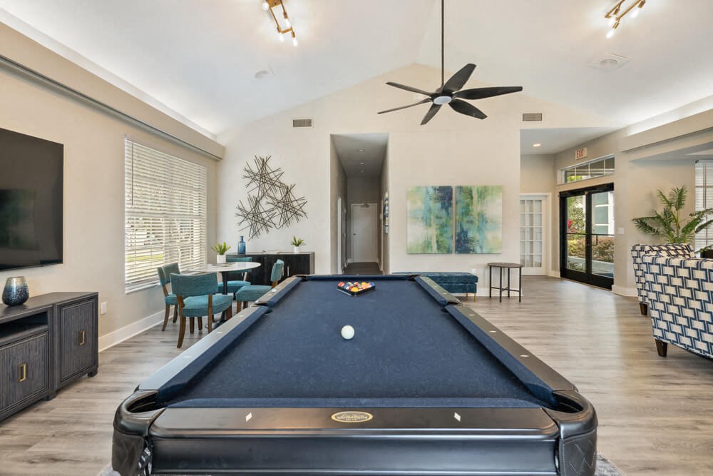 Lobby with billiards table at Vue at Baymeadows Apartments in Jacksonville, Florida