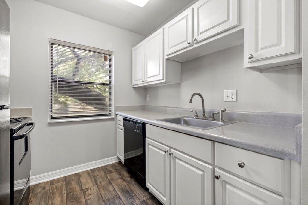 Model kitchen at Oasis at Bayside Apartments in Largo, FL
