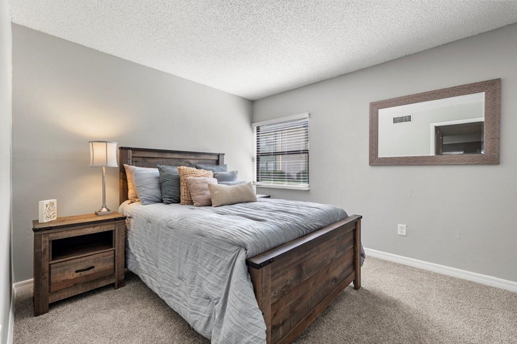 Model bedroom at Oasis at Bayside Apartments in Largo, FL