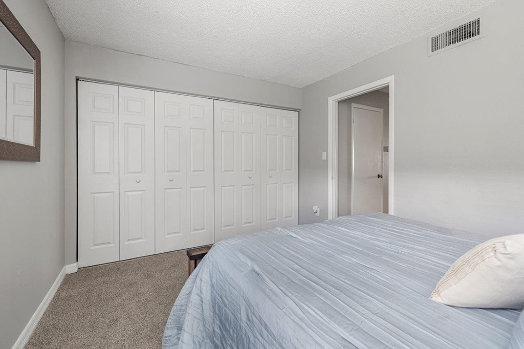 Model bedroom at Oasis at Bayside Apartments in Largo, FL