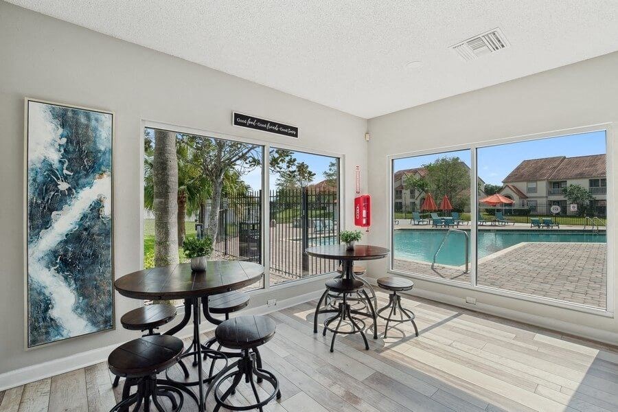 Community clubhouse dining area near swimming pool