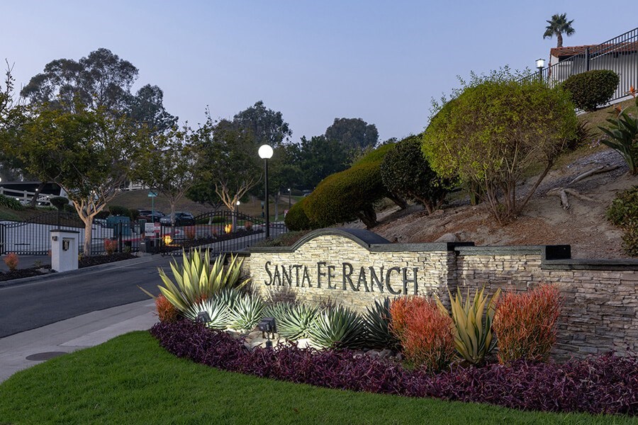 Community Monument Sign and Landscape at Santa Fe Ranch Apartments located in Carlsbad, CA.