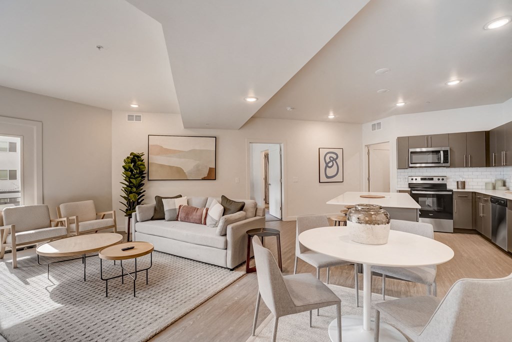 a living room with a couch and a table