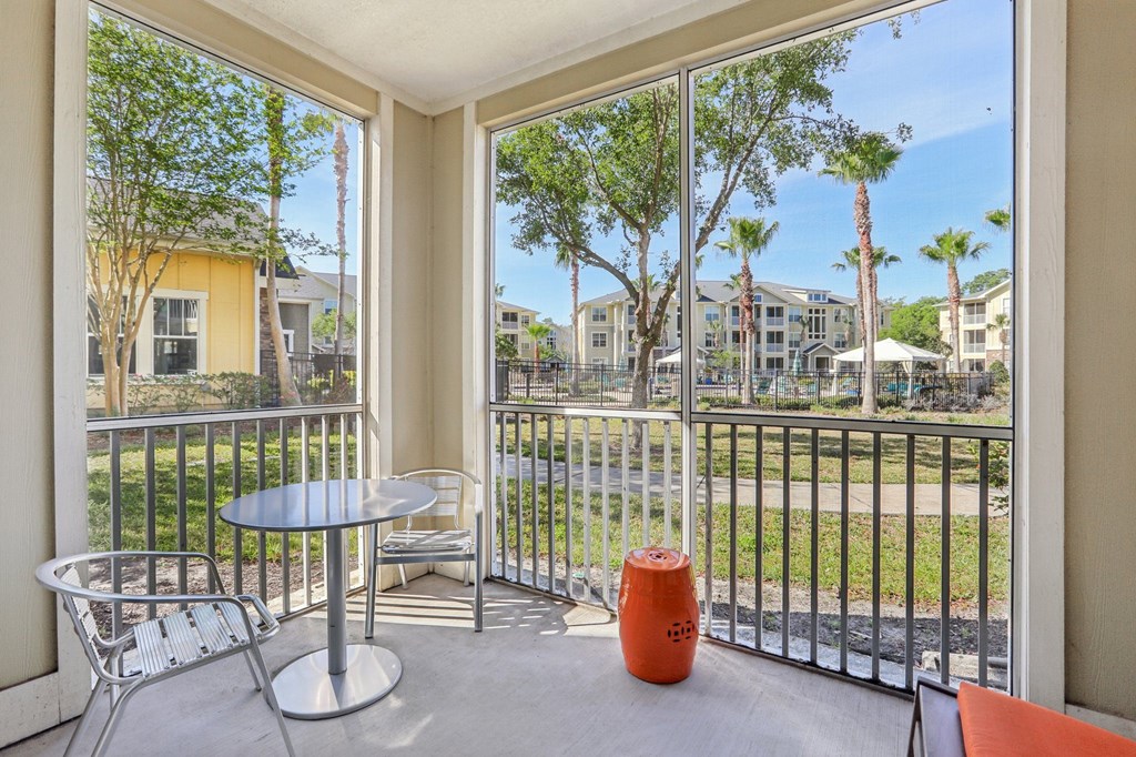 Model balcony with patio furniture.