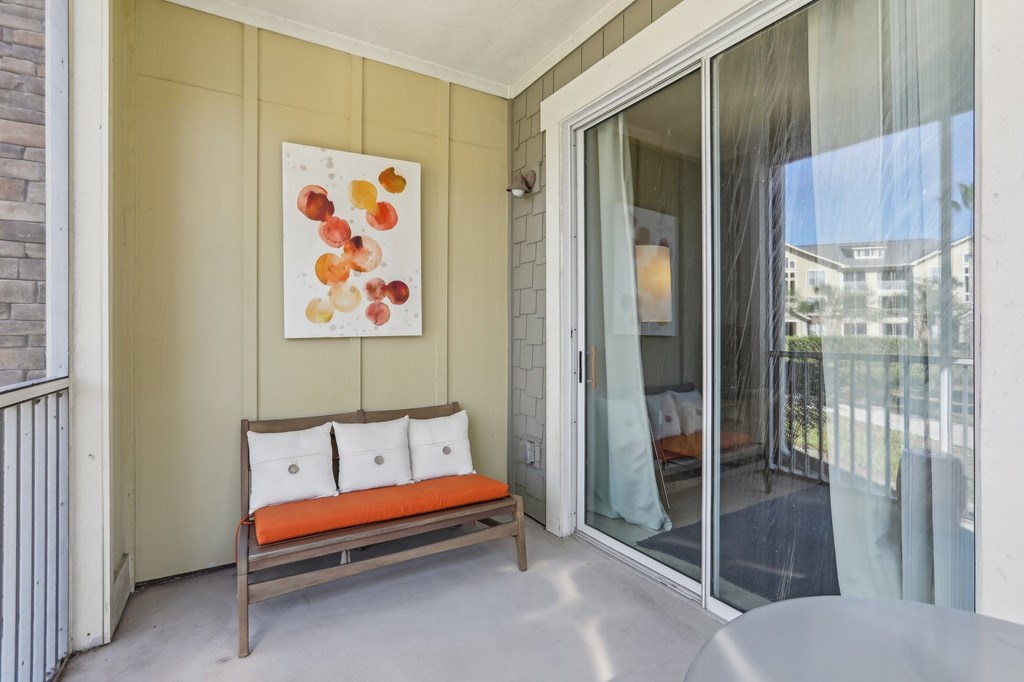 Model balcony with patio furniture.