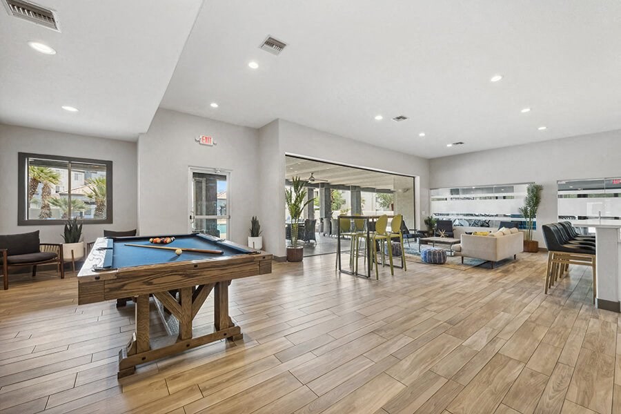Community Clubhouse with Lounge Furniture and Game Tables at Array South Mountain, Phoenix, Arizona