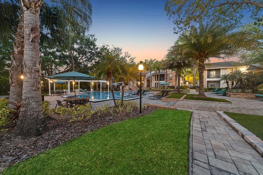 Community Swimming Pool and Landscape at Grand Pavilion Apartments in Tampa, FL.