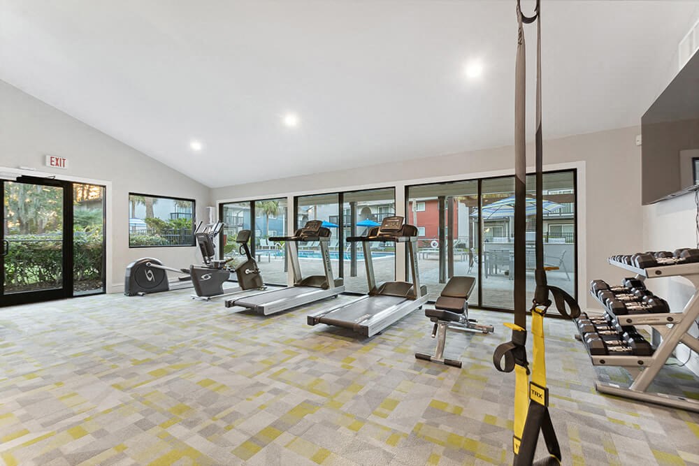 Community Fitness Center with Equipment at Heron Walk Apartments in Jacksonville, FL.