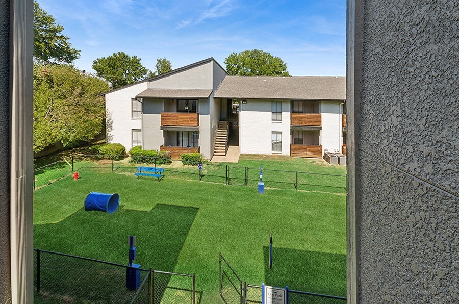 Community Dog Park with Agility Equipment at Summit Ridge Apartments located in Arlington, TX.