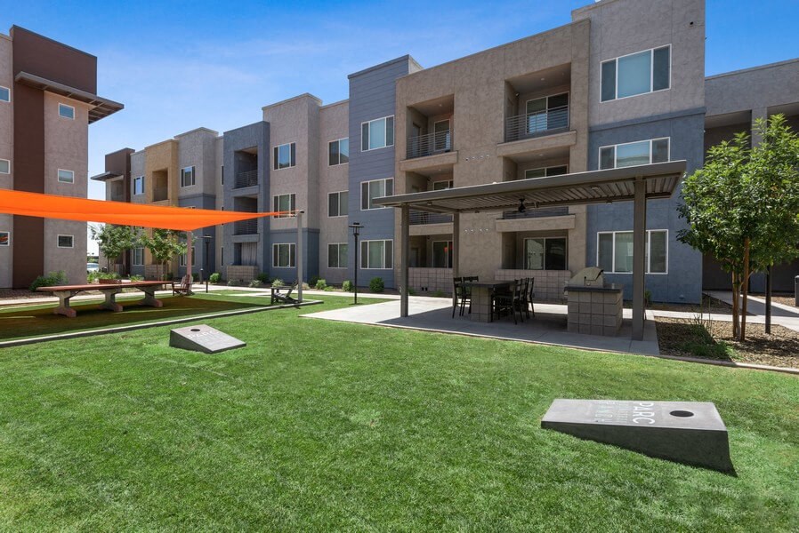 Cornhole game at apartment community