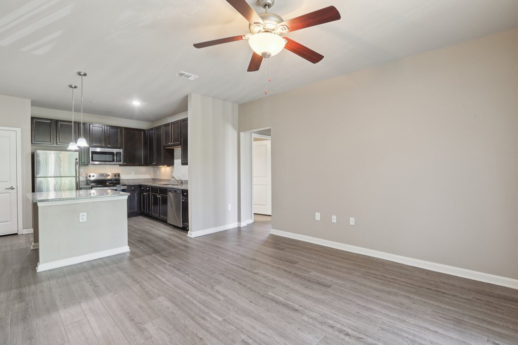 Model kitchen with a fan on the ceiling.
