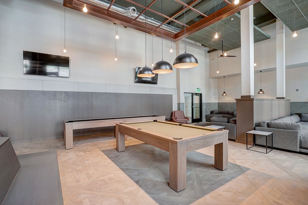 pool table in clubhouse at the district flats apartments in lenexa