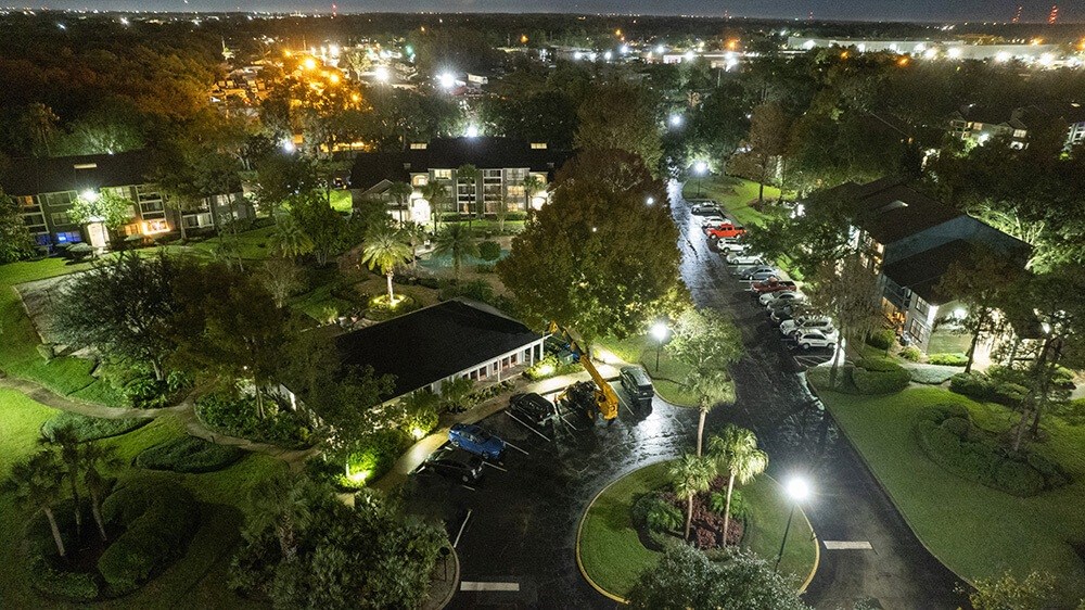 Aerial View of Community Clubhouse and Parking Lot at Fountains at Lee Vista Apartments in Orlando, FL.
