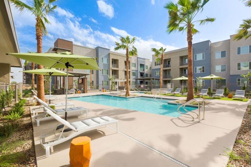 Pool and sundeck with lounge chairs - Photo Gallery