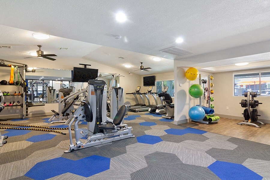 fitness room with exercise equipment