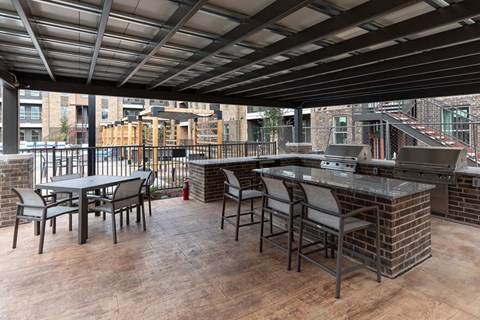 BBQ and picnic area at Alta 3Eighty Apartments in Aubrey, TX