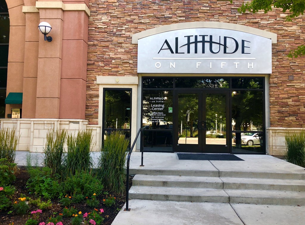 Apartment building exteriors and entrance sign