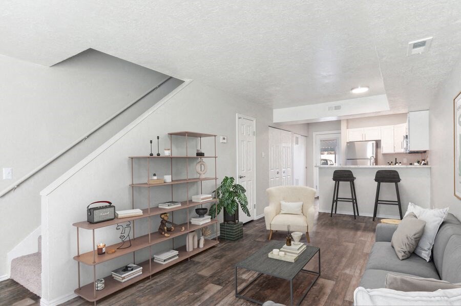 Model living room with a couch and a coffee table