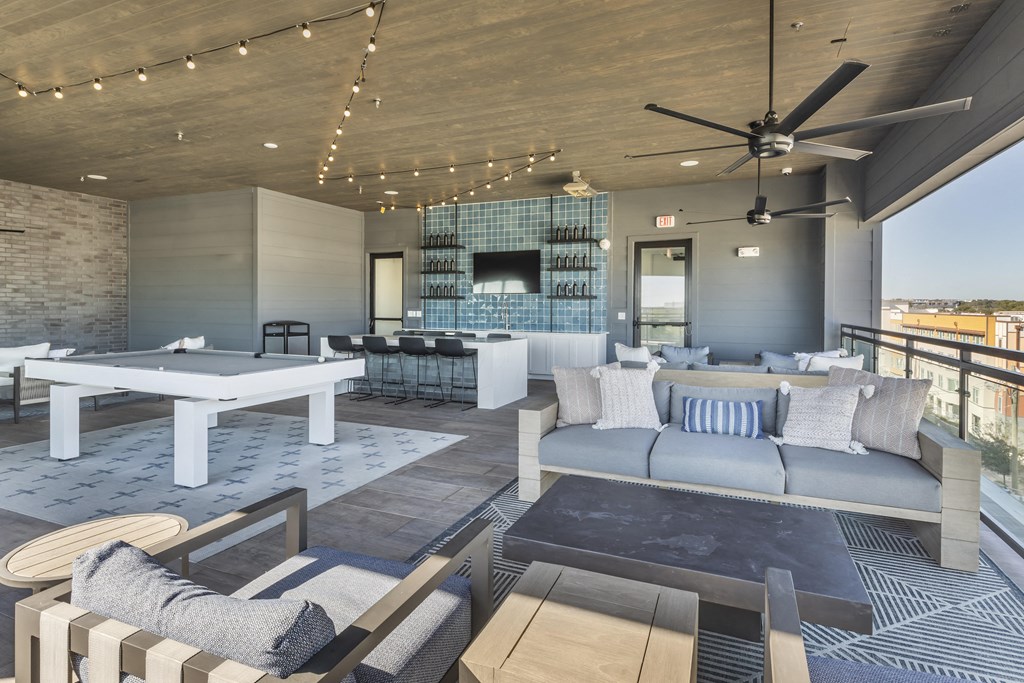 a living room with couches and a table