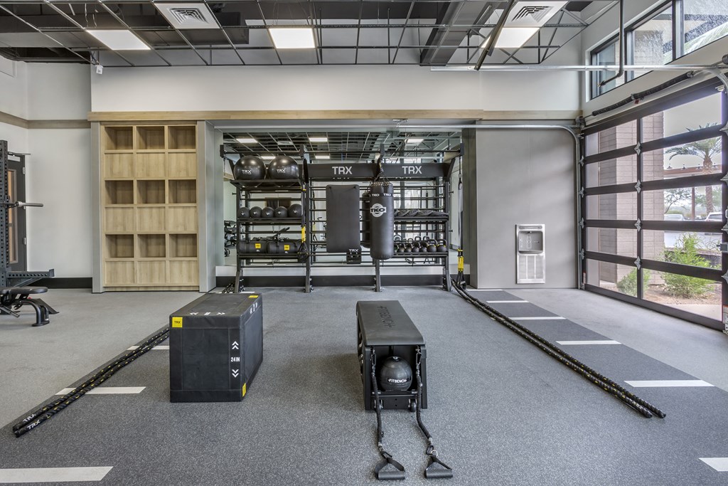 a large training room with weights and machines